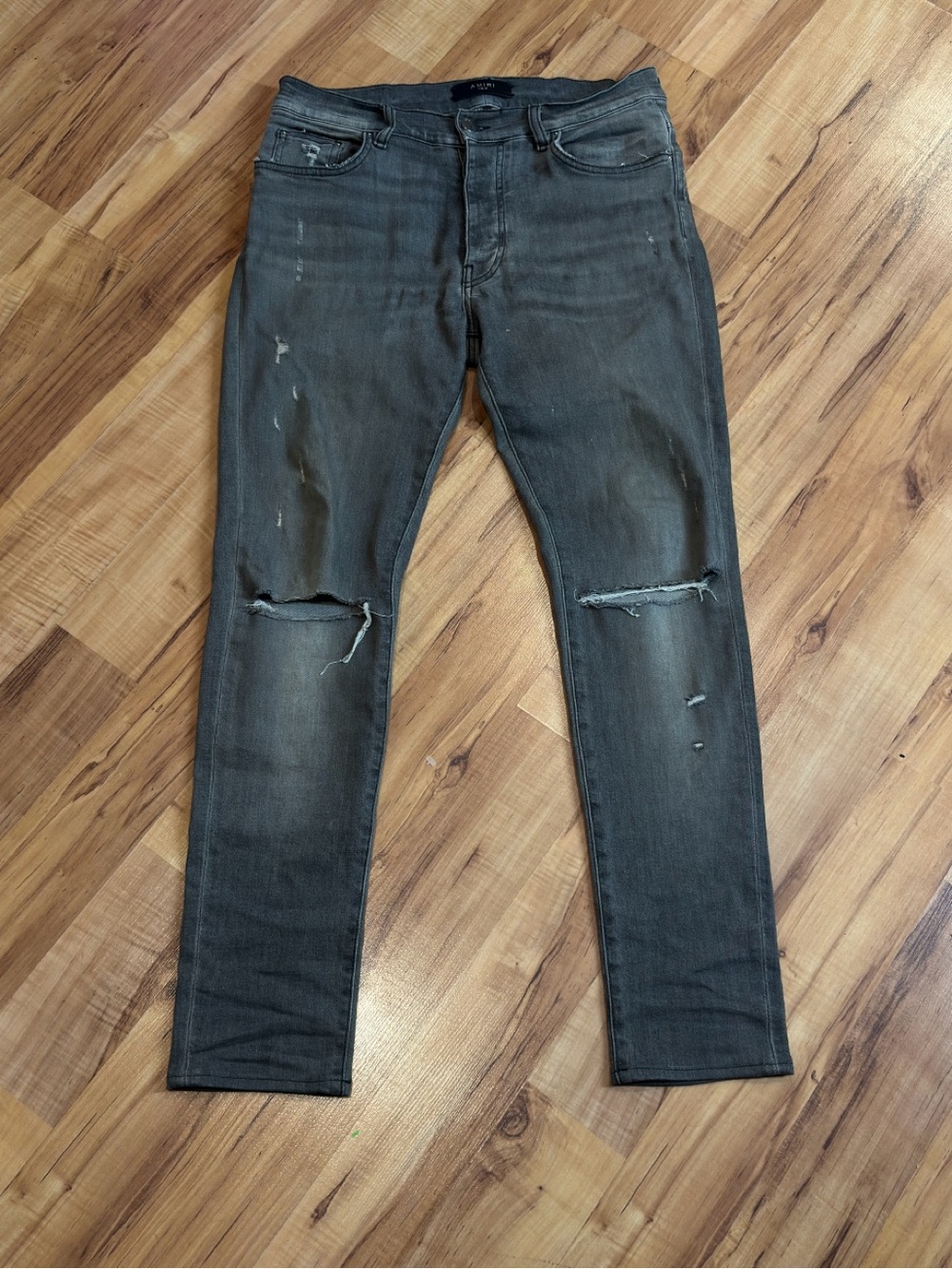 AMIRI Thrasher “Washed Grey / Aged Charcoal” Skinny Jeans